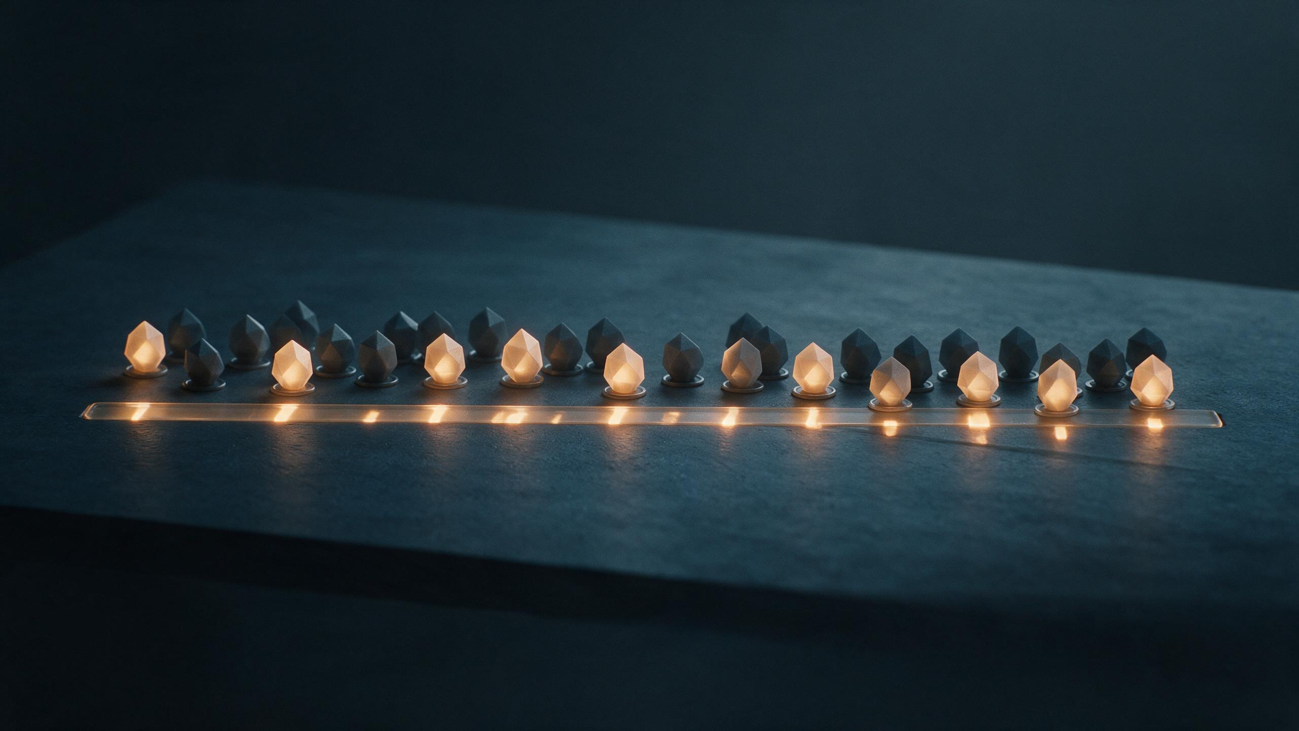 A row of items where only some are lit and recorded on the ledger below, the unlit ones leaving conspicuous gaps in the record